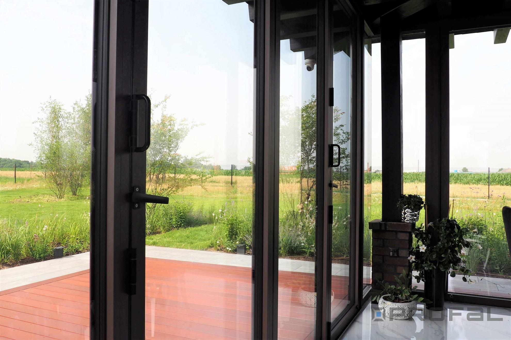 decalu-folding-doors-inside-view - Aluminium windows and doors manufacturer UK - Profal Aluminium